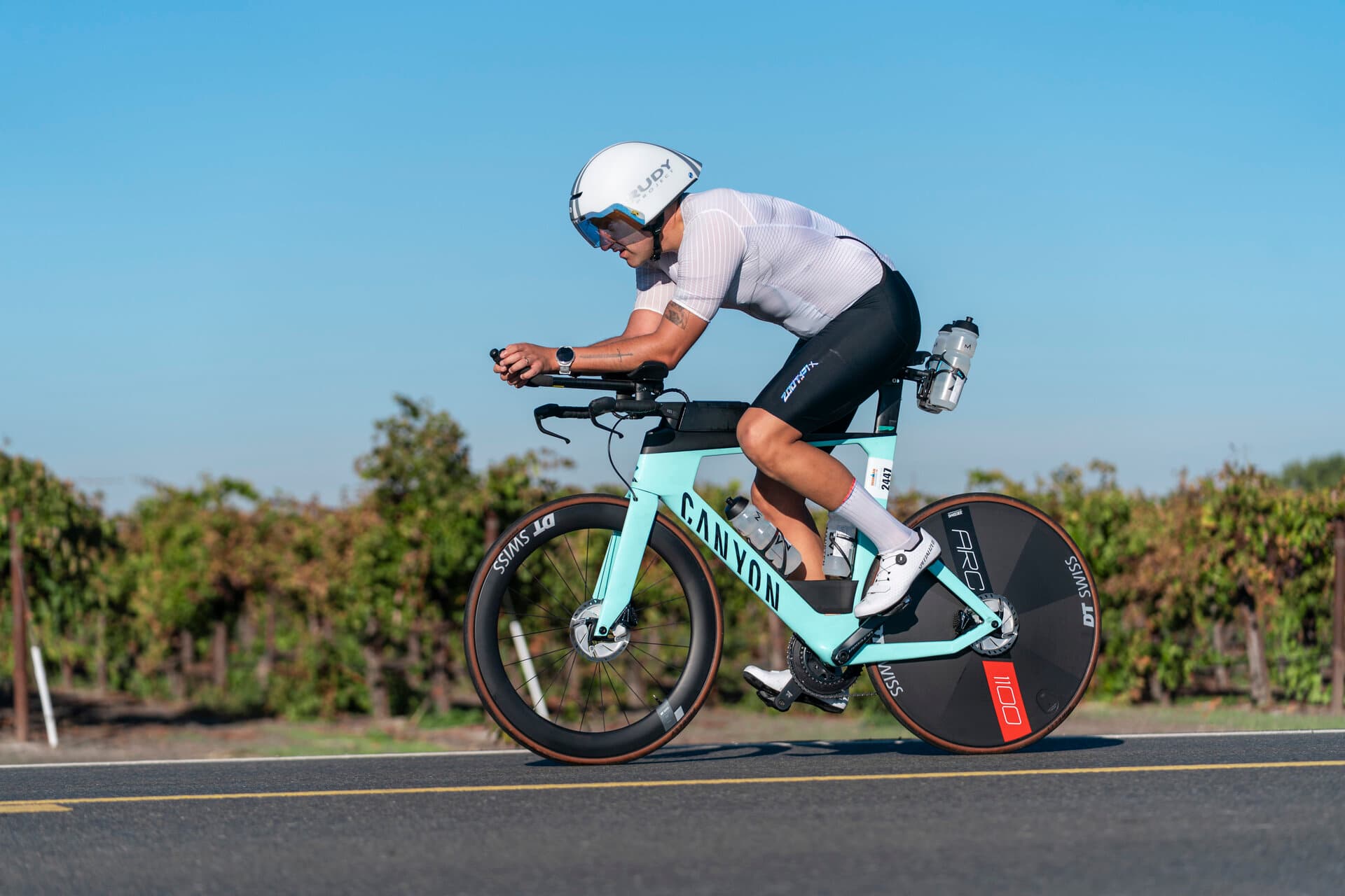 Triathlete racing on bike